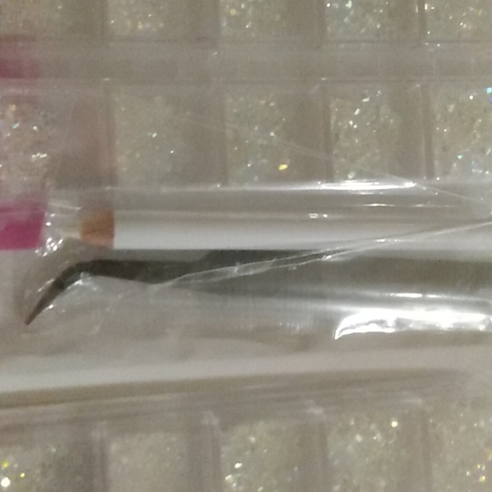 two packages of nail gems